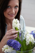 Woman with hyacinths