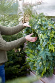 Hanging a christmas wreath