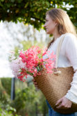 Young lady with Nerine flowers