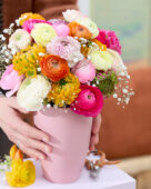 Mixed double flowering Ranunculus bouquet 	
Ranunculus Cappuccino
Ranunculus Elegance White
Ranunculus Elegance Hot Pink	
Ranunculus Elegance Orange
Ranunculus Pon Pon Merlino	
Ranunculus Pon Pon Fanny
Ranunculus Elegance Crema
Ranunculus Amandine Marshmallow
