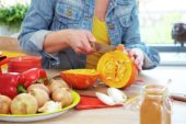 Cutting pumpkin for making soup