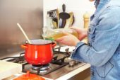 Pouring broth in cooking pan