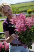 Woman holding Astilbe