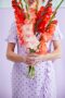 Lady holding mixed bunch of Flamencos gladioli, Forever Bulbs, Gladiolus Ted's Frizzle