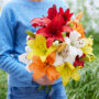 Lady holding bunch of lilies