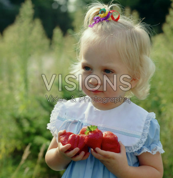 Girl with strawberries