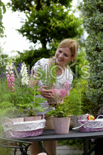 Woman holding Astilbe