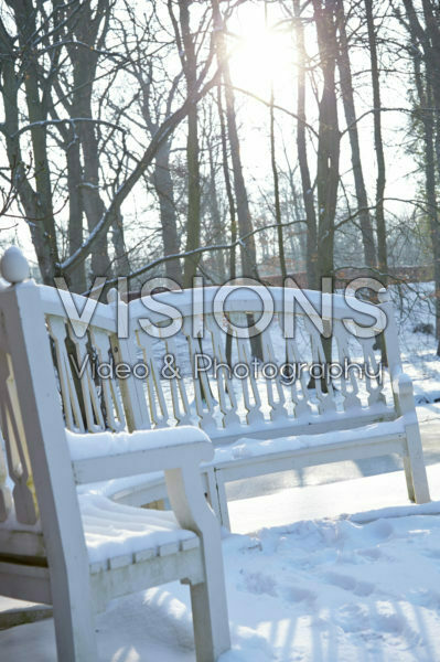 Snow covered bench
