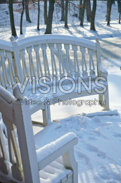 Snow covered bench