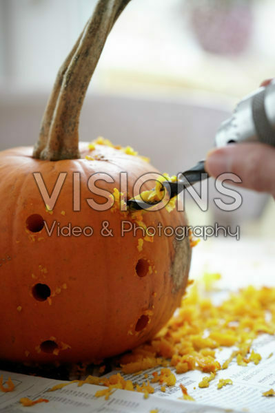 Carving halloween pumpkin