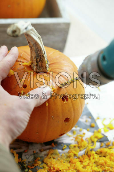 Carving halloween pumpkin