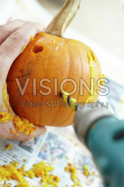 Carving halloween pumpkin