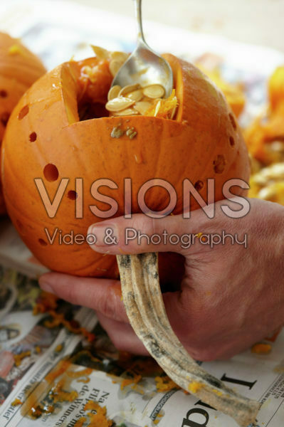 Carving halloween pumpkin