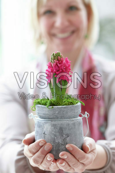 Holding hyacinths