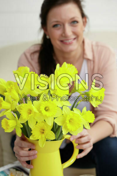 Woman with daffodils