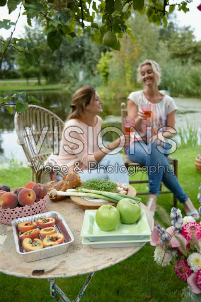Ladies toasting in garden Ladies toasting in garden