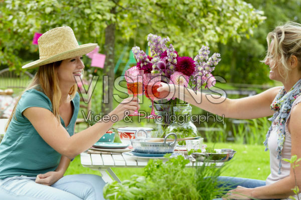 Ladies toasting in garden