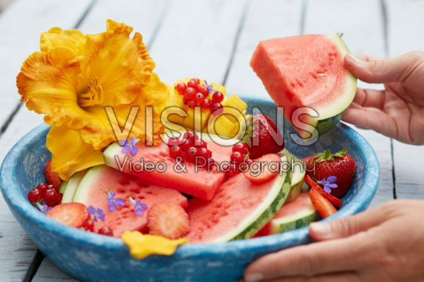 Fresh fruit with daylily flower