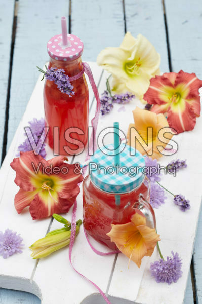 Summer drinks with daylily flowers