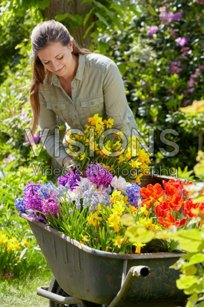 Young lady with spring flowers