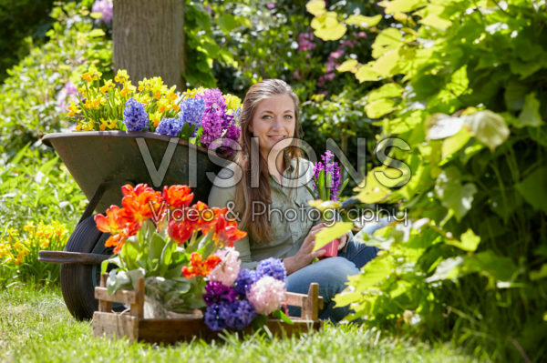 Young lady with spring flowers