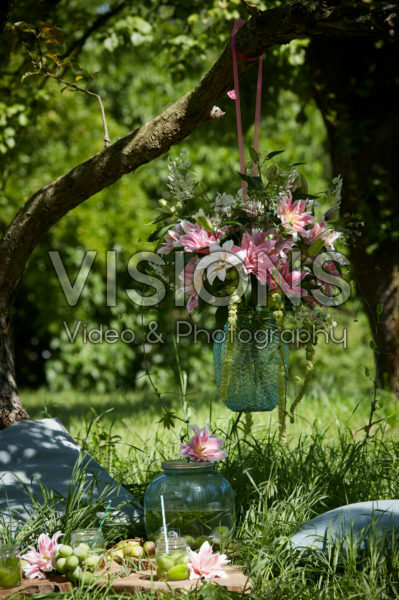 Hanging vase with lilies Hanging vase with lilies