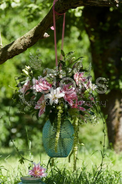 Hanging vase with lilies Hanging vase with lilies