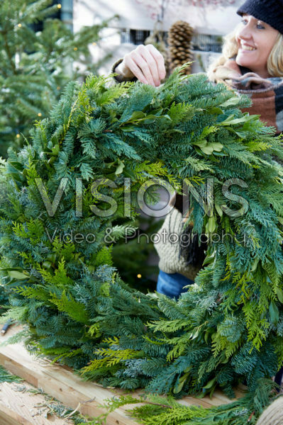 Lady with christmas wreath