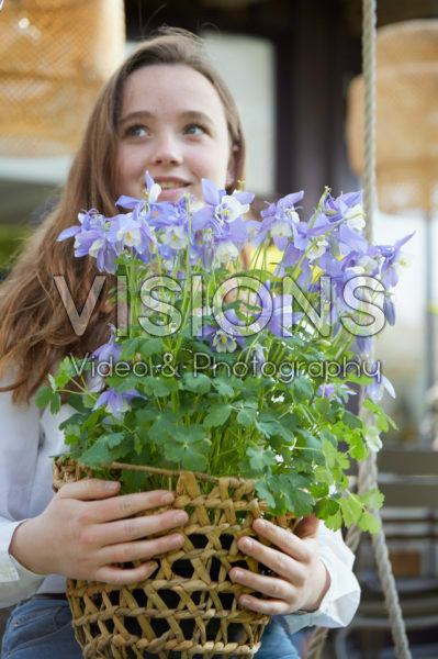 Young lady with Aquilegia