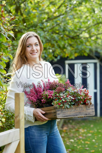 Young lady with autumn container