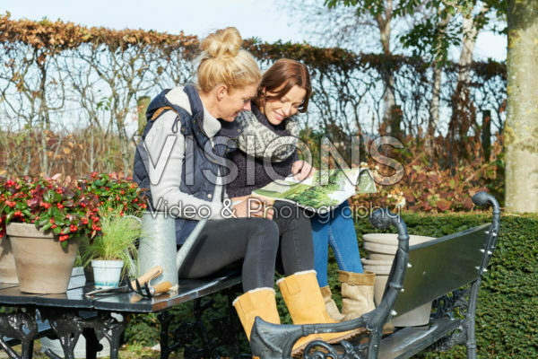 Ladies in autumn garden Ladies in autumn garden