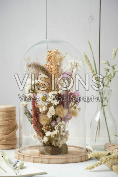Dried flowers arrangement in glass stolp Dried flowers arrangement in glass stolp