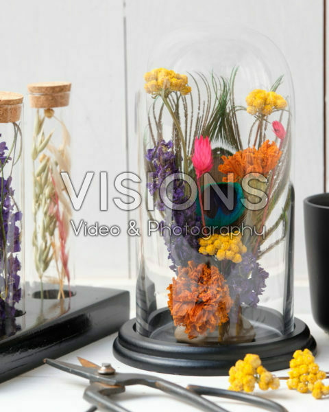 Dried flowers arrangement in glass stolp Dried flowers arrangement in glass stolp