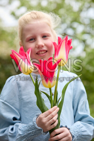 Girl holding Love Story tulips Girl holding Love Story tulips