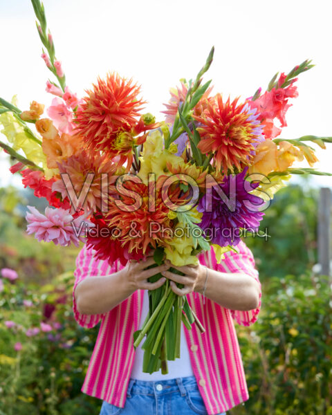 Lady with mixed summer flowers Lady with mixed summer flowers