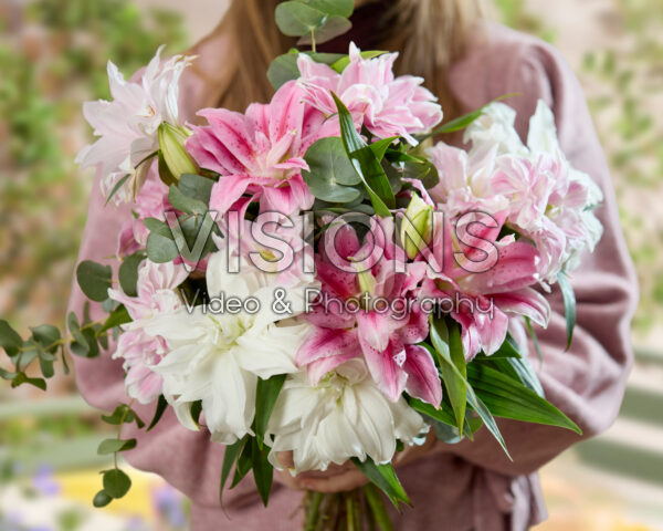 Lady with mixed double oriental bouquet