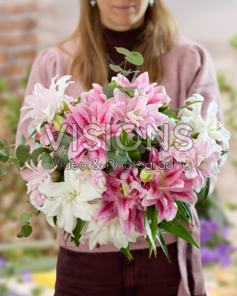 Lady with mixed double oriental bouquet