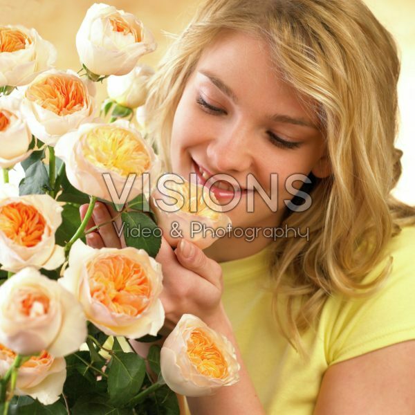 Woman with bouquet of roses