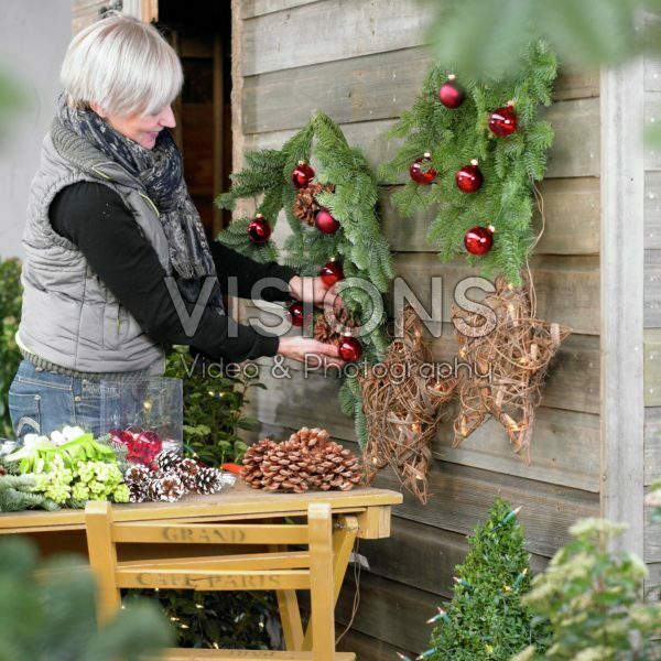 Woman making christmas decorations