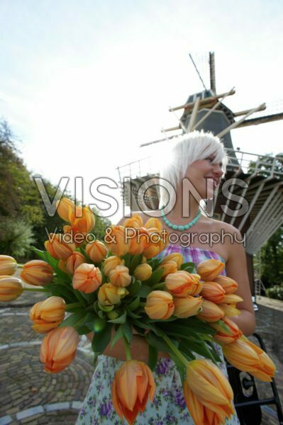 Woman holding tulips