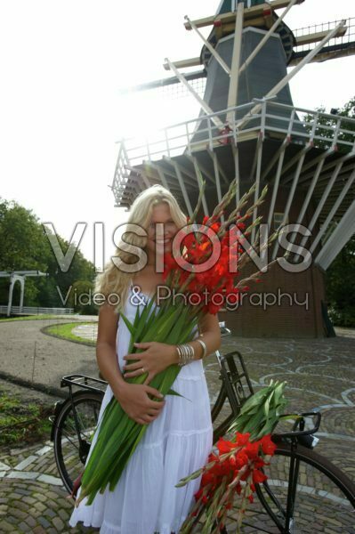 Woman holding gladiolus
