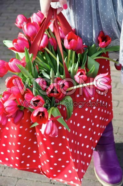 Woman holding tulips