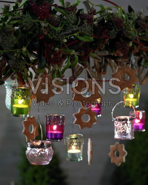 Candles hanging on christmas arrangement Candles hanging on christmas arrangement